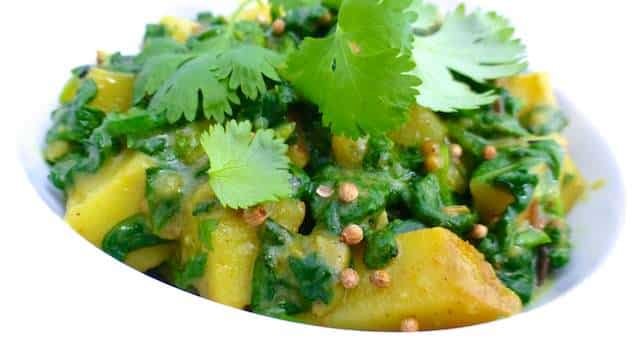 My easy aloo palak recipe, an Indian stir fry of potatoes and spinach with a bunch of great spices. A classic Indian recipe!