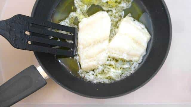 This is a classic Spanish salt cod recipe with a thick garlic, olive oil and chili sauce: also known as bacalao al pil pil!