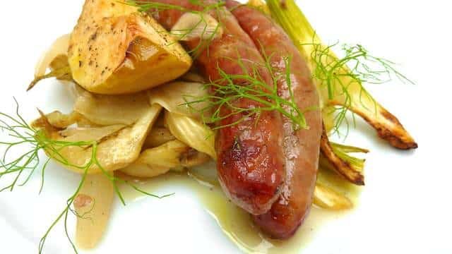 Easy White Wine Braised Fennel Recipe Well hey, how about some baked sausage today! It might look like a hearty winter oven dish but it's surprisingly light, crisp and fresh.
