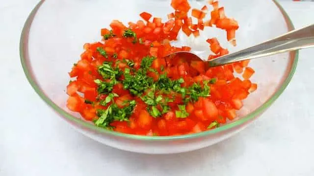 Easy Italian Bruschetta Recipe Here's a classic summer appetizer recipe: my Italian bruschetta recipe. Plain and simple, diced tomatoes with fresh basil.
