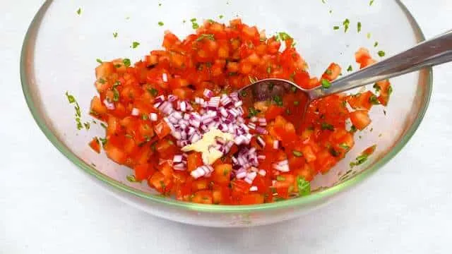 Easy Italian Bruschetta Recipe Here's a classic summer appetizer recipe: my Italian bruschetta recipe. Plain and simple, diced tomatoes with fresh basil.