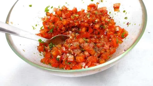 Easy Italian Bruschetta Recipe Here's a classic summer appetizer recipe: my Italian bruschetta recipe. Plain and simple, diced tomatoes with fresh basil.