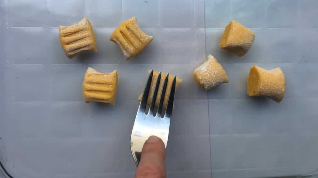 Crunchy pan seared pumpkin gnocchi with ricotta and parmesan cheese... This homemade gnocchi recipe is a great autumn side dish!
