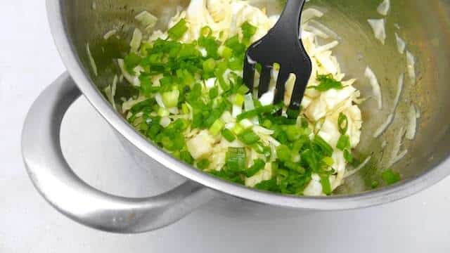 My super creamy colcannon recipe or classic Irish mashed potatoes with green cabbage; fresh spring onion and lots of butter...