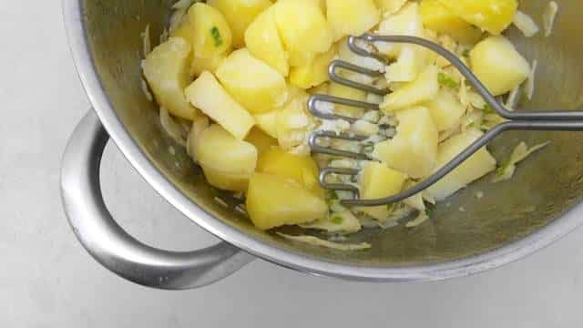 My super creamy colcannon recipe or classic Irish mashed potatoes with green cabbage; fresh spring onion and lots of butter...
