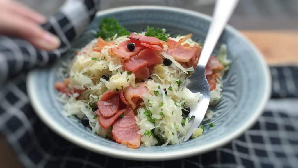 Sauerkraut with bacon smothered in white wine... This is such a fresh and tasty side dish for pork or poached salmon steaks!