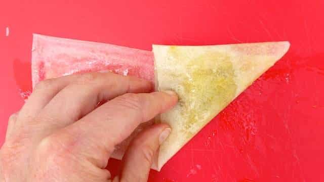 Moroccan Pastilla Recipe: crunchy baked pastry triangles filled with chicken and spices...