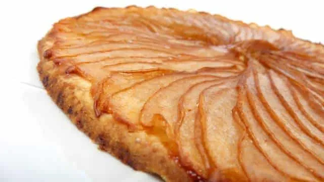 Easy Pear Tart Recipe (Tarte aux Poires) Pear tart recipe: my version of a French pear tart! Make sure to pick a firm pear variety that is perfect to cook with or this tart will be mushy!