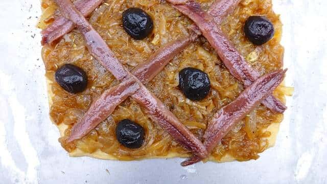 French pissaladiere, a caramelized onion pizza with black olives and salted anchovies from the mediterranean city of Nice!