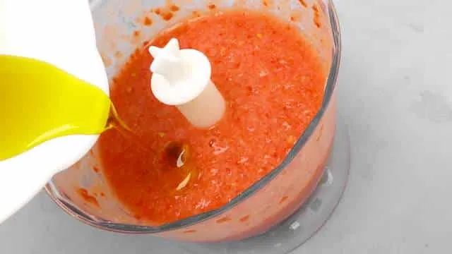 Easy Andalusian Cold Salmorejo Tomato Soup Savory salmorejo soup: a refreshing chilled Spanish tomato, bread and vinegar soup! Traditionally garnished with ham and boiled eggs.