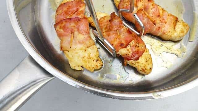 My classic chicken saltimbocca recipe: a traditional Italian recipe with prosciutto wrapped chicken in a light white wine sauce!