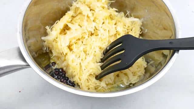 Sauerkraut with bacon smothered in white wine... This is such a fresh and tasty side dish for pork or poached salmon steaks!