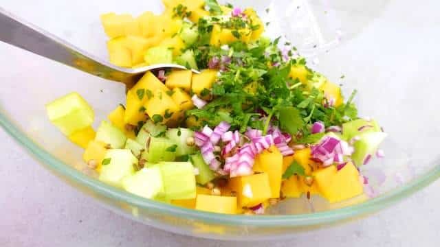 Here's my crunchy shrimp tacos recipe with grilled shrimp and a fresh cucumber, chopped cilantro and a sweet mango salsa...