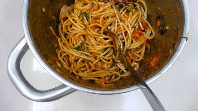 My delicious fresh squid spaghetti recipe with fresh tomatoes, black olives and basil... This is a splendid mediterranean pasta dish!