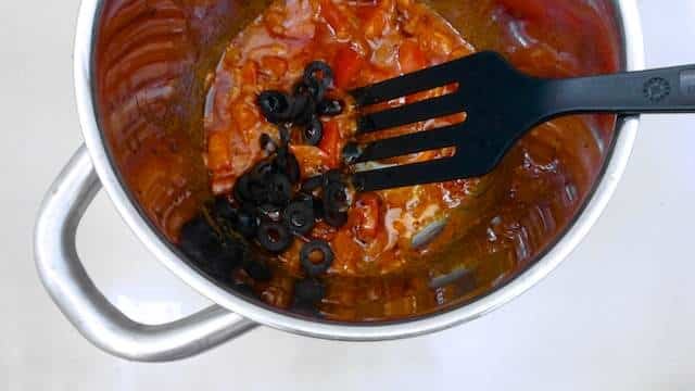 My delicious fresh squid spaghetti recipe with fresh tomatoes, black olives and basil... This is a splendid mediterranean pasta dish!