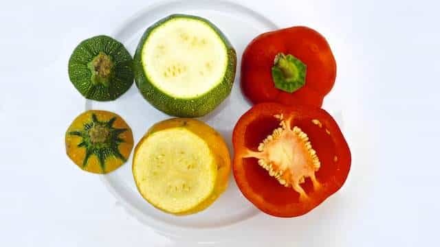 Stuffed Zucchini Recipe, a classic French recipe called 'petits farcis'! Soft grilled vegetables stuffed with flavorful meatballs...