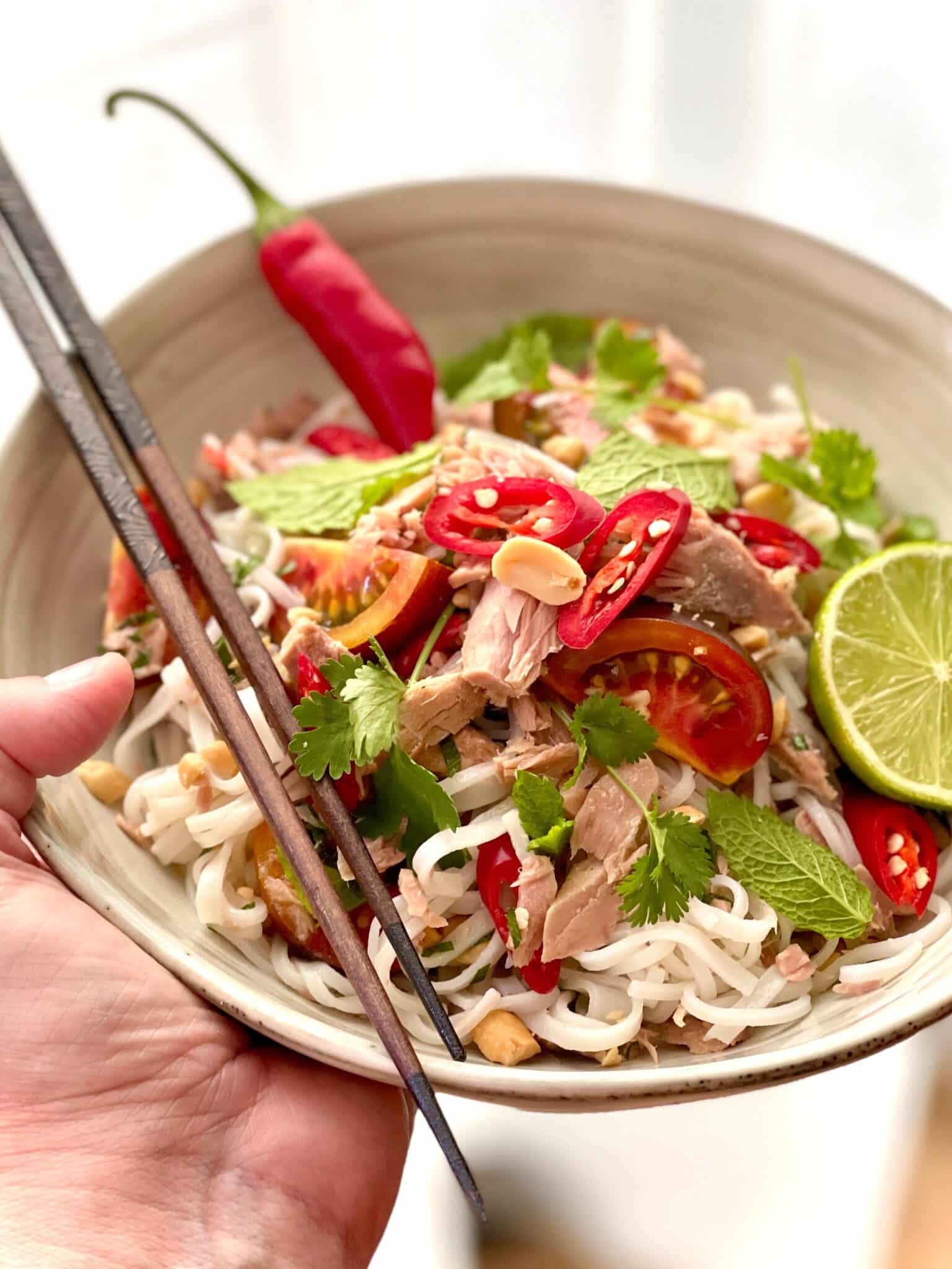 A fresh and easy Thai style tuna noodle salad: a chunky noodle salad with canned tuna, fresh cilantro and cherry tomatoes!