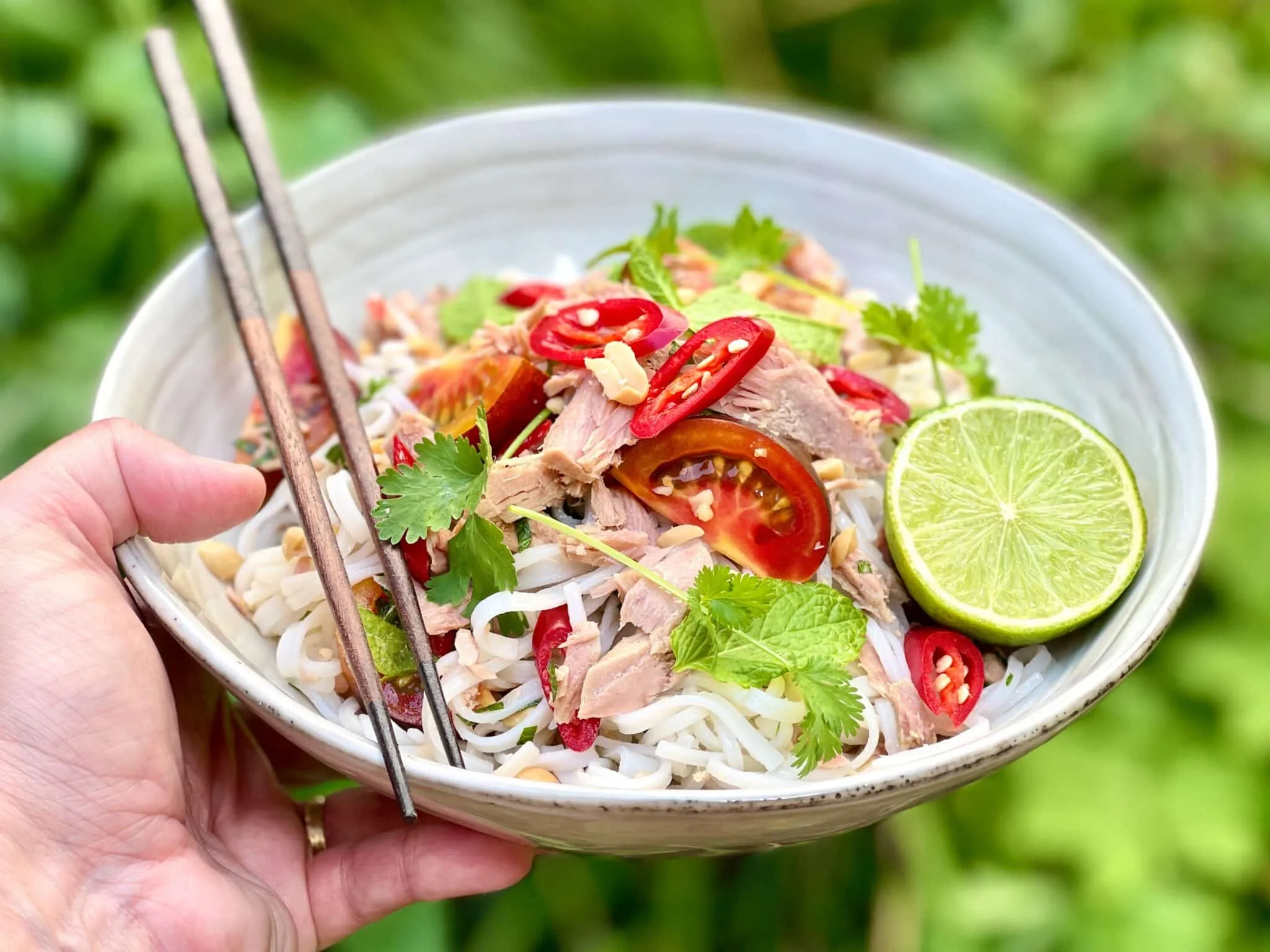 Easy Thai Tuna Noodle Salad Recipe A fresh and easy Thai style tuna noodle salad: a chunky noodle salad with canned tuna, fresh cilantro and cherry tomatoes!