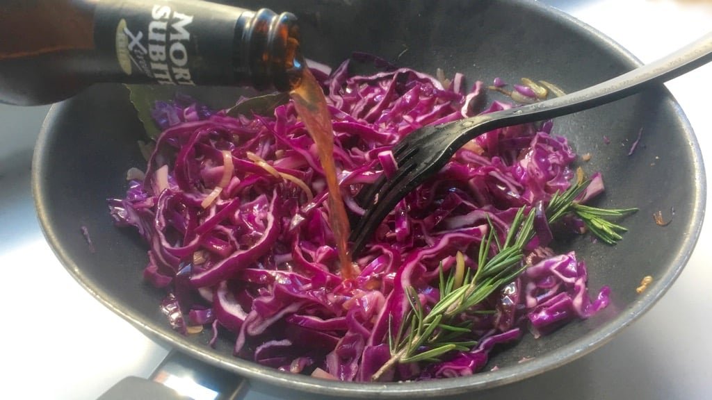 Sliced red cabbage in flavorful kriek beer: what an amazing flavor match this is! Try out this braised red cabbage recipe...