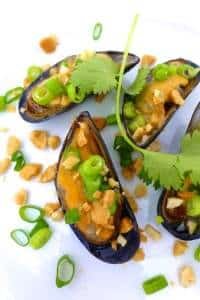 Easy Grilled Mussels Vietnamese Style Vietnamese grilled mussels with butter, spring onion and salted peanuts... prepare yourself for a finger lickin' good seafood treat!