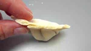 How to fold gyoza: learn here how to make gyoza dough from scratch and the easy folding technique with step-by-step pictures!