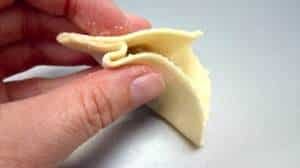 How to fold gyoza: learn here how to make gyoza dough from scratch and the easy folding technique with step-by-step pictures!