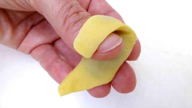How to make tortellini from scratch: a step-by-step picture guide to show you how to fold fresh tortellini the right way!