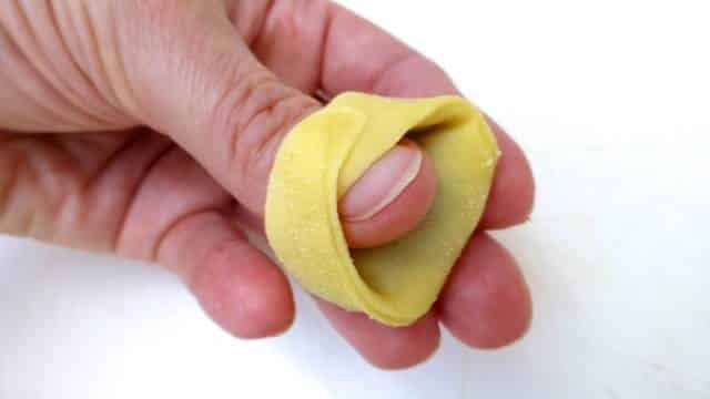 How to make tortellini from scratch: a step-by-step picture guide to show you how to fold fresh tortellini the right way!