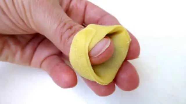 How To Make Tortellini the Easy Way How to make tortellini from scratch: a step-by-step picture guide to show you how to fold fresh tortellini the right way!