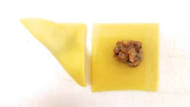 How to make tortellini from scratch: a step-by-step picture guide to show you how to fold fresh tortellini the right way!