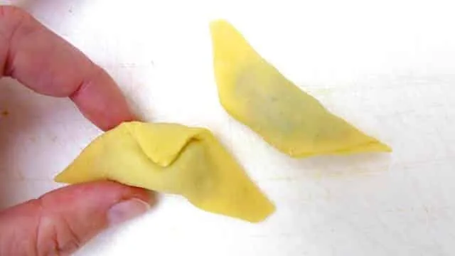 How To Make Tortellini the Easy Way How to make tortellini from scratch: a step-by-step picture guide to show you how to fold fresh tortellini the right way!