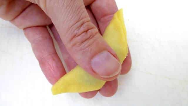 How to make tortellini from scratch: a step-by-step picture guide to show you how to fold fresh tortellini the right way!