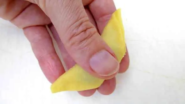How To Make Tortellini the Easy Way How to make tortellini from scratch: a step-by-step picture guide to show you how to fold fresh tortellini the right way!