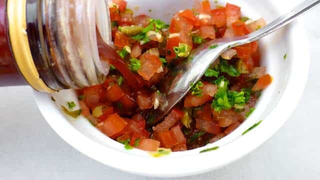 Now here's a super tasty cold appetizer: mussels vinaigrette recipe or cooked mussels topped with a fresh tomato bruschetta!
