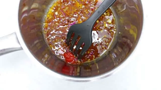 Pea stir fry with explosive Asian flavors: oyster sauce, freshly grated ginger, soy sauce, sriracha chili sauce, tomato paste and lemon juice!