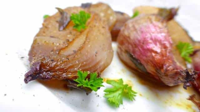 Easy Oven Roasted Shallots Recipe How sweet do these roasted shallots look? Incredibly sweet, that's what I think! These are a great side dish for lamb or steak!