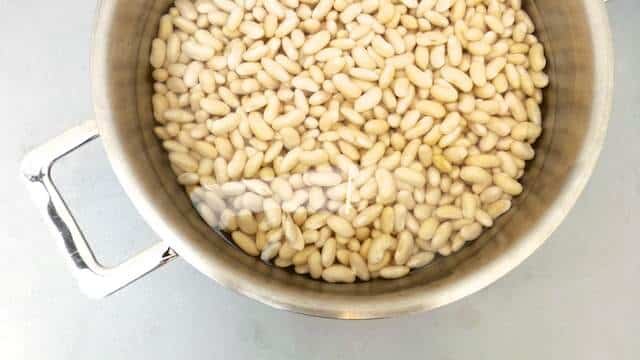 Less is truly more... how about these lukewarm braised Italian white beans in lots of olive oil, my favorite white beans recipe ever!