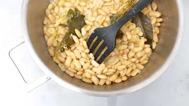 Less is truly more... how about these lukewarm braised Italian white beans in lots of olive oil, my favorite white beans recipe ever!