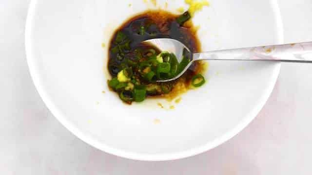 My super juicy homemade lamb burger recipe... Drizzled with an interesting Asian dressing of red miso paste, fish sauce and soy sauce!