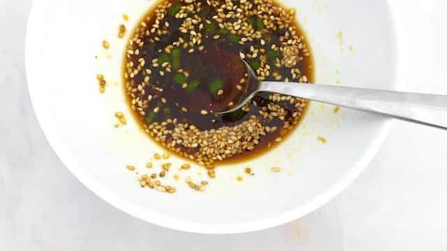 My super juicy homemade lamb burger recipe... Drizzled with an interesting Asian dressing of red miso paste, fish sauce and soy sauce!