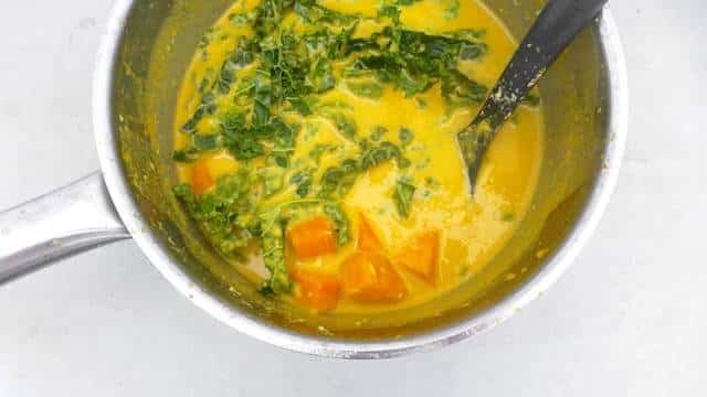 Coconut kale and pumpkin bisque, a hearty autumn soup! This pumpkin bisque is based on a stunning Nyonya dish I tasted in Penang (Malaysia).
