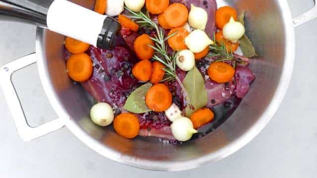 Civet de lievre recipe or stewed hare in red wine with carrots, pearl onion, juniper berries and rosemary... a winter classic!