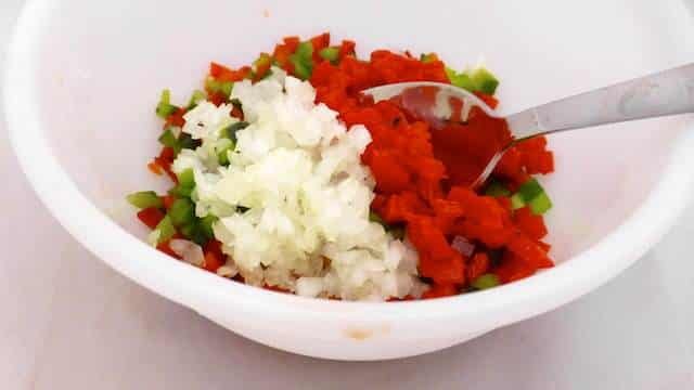 Salpicon de atun is a typical Spanish dish of mixed vegetables in a vinegar and olive oil dressing and canned or cooked fish and seafood.