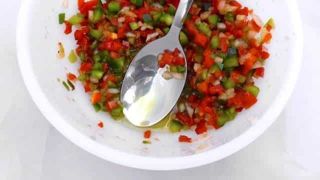Salpicon de atun is a typical Spanish dish of mixed vegetables in a vinegar and olive oil dressing and canned or cooked fish and seafood.