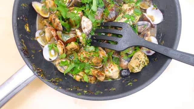 Porco a Alentejana, a popular Portuguese dish with pork and clams! Mixing meat and fish or seafood is quite popular in Portuguese cuisine.