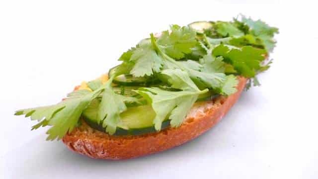Vietnamese banh mi sandwich with sausage, mint, coriander, cucumber, carrots, spring onion and mayonnaise... great lunch idea!