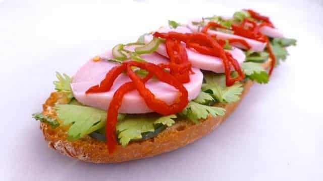 Vietnamese banh mi sandwich with sausage, mint, coriander, cucumber, carrots, spring onion and mayonnaise... great lunch idea!
