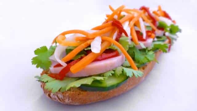Vietnamese banh mi sandwich with sausage, mint, coriander, cucumber, carrots, spring onion and mayonnaise... great lunch idea!