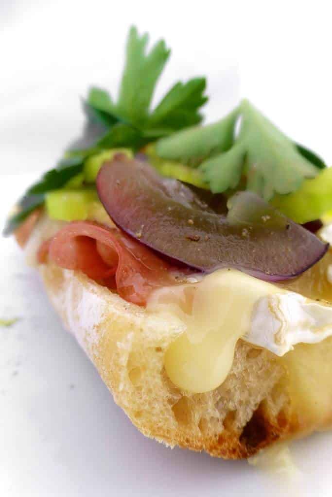 Gooey grilled brie sandwich with Italian mortadella, freshly chopped celery and sweet grapes... I can assure you lunch doesn’t have to be boring at all!