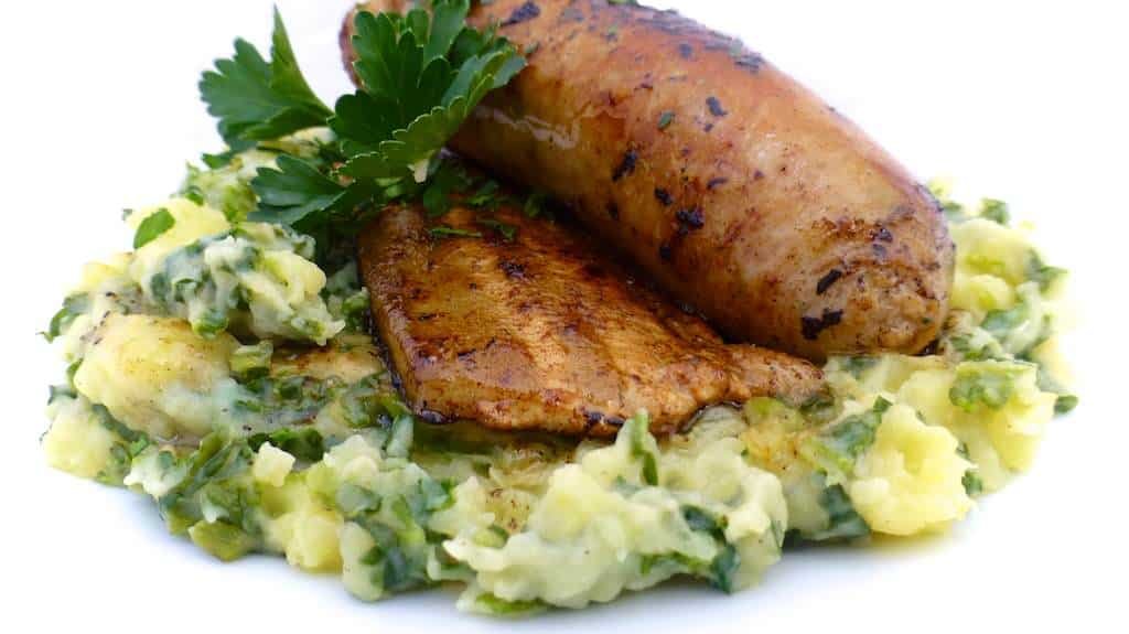 My Flemish stoemp: creamy savoy cabbage potato mash with baked sausage and bacon... Good old-fashioned Belgian comfort food!